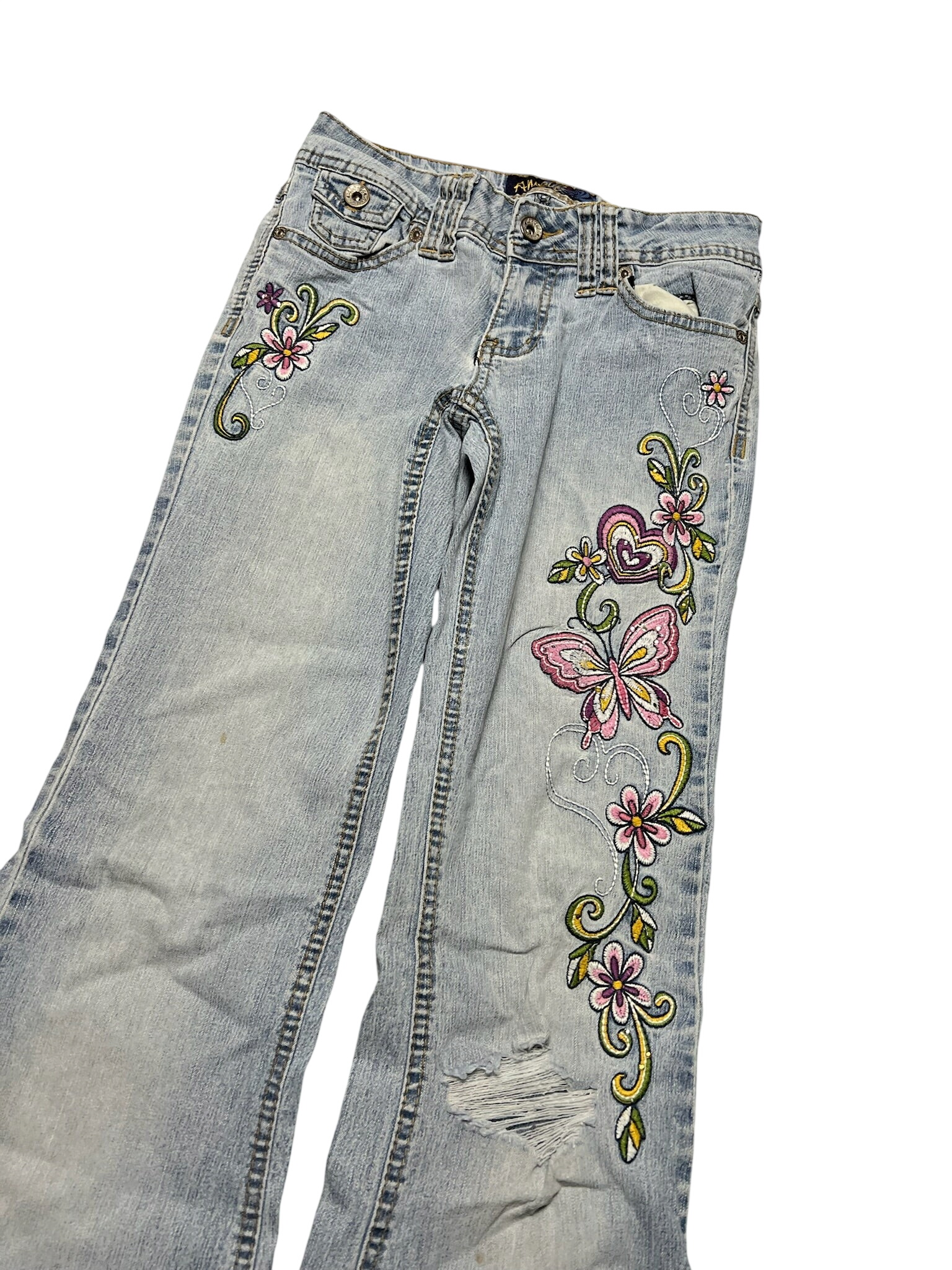 JOMAVINTAGE Y2K low waist bootcut jeans in light wash denim with embroidered butterfly and floral heart designs